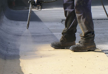 Coating systems over Helena spray foam roof systems